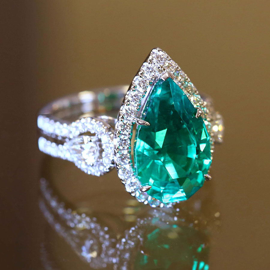 pear shaped emerald ring with diamonds