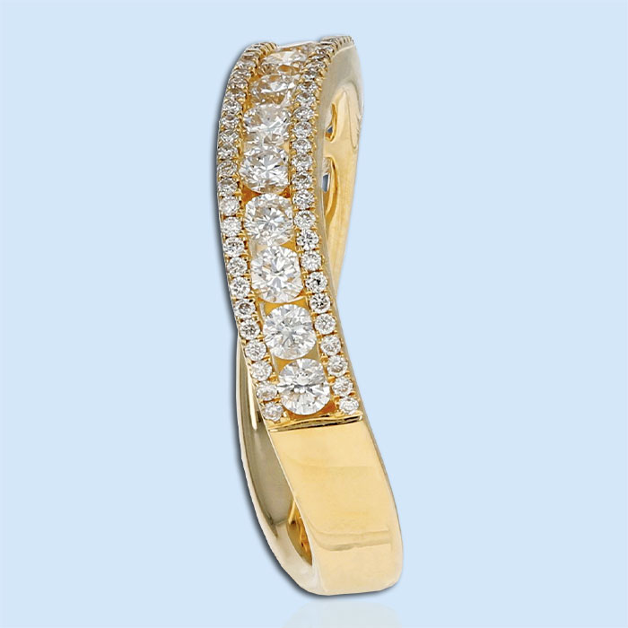 Wavy yellow gold diamond wedding ring