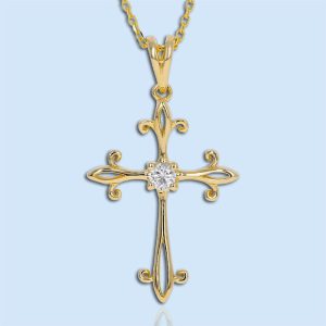 fancy filigree yellow gold cross pendant with a diamond