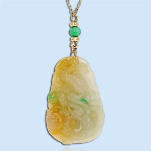 Yellow gold carved jadeite jade dragon necklace