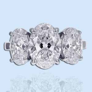oval three stone diamond ring in platinum